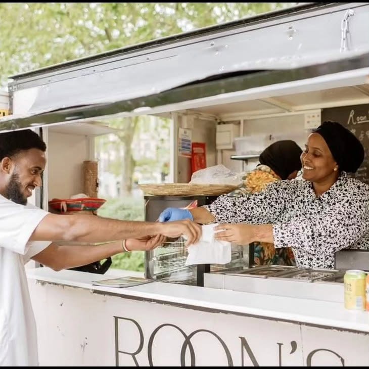 Roon's Catering — serving a customer from the trailer